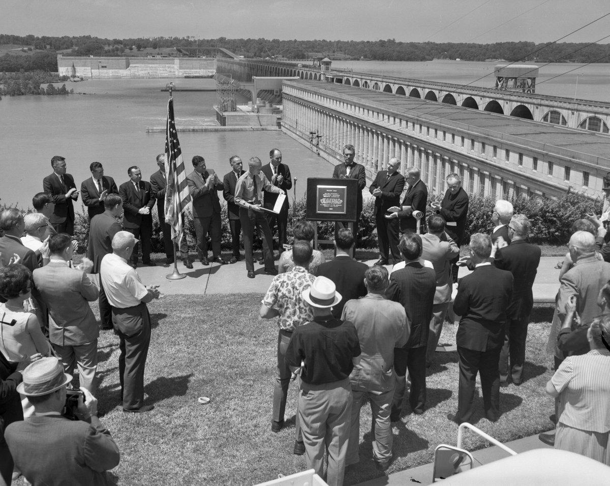 TVAnews's tweet photo. Wilson Dam is a megastructure! Stretching 4,541 feet across the Tennessee River in Florence, AL, it has 21 generating units producing 653 megawatts, and its main navigation lock is the highest single lift lock east of the Rocky Mountains. Named for President Woodrow Wilson, TVA acquired it in 1933. Take a virtual tour of this amazing National Historic Landmark.⬇️ https://t.co/Vhy23BfaMU #TBT