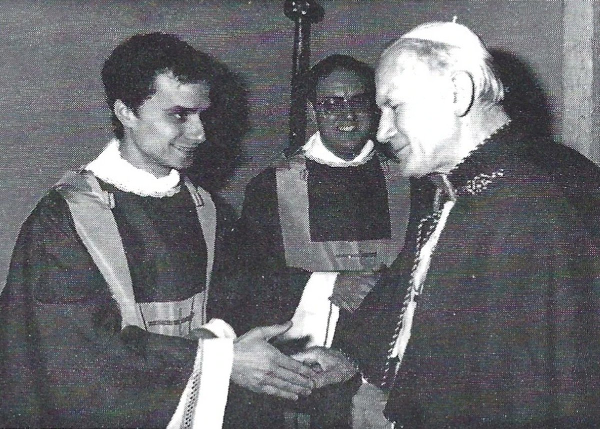 Young Robert Prevost with Pope John Paul II in the 1980s