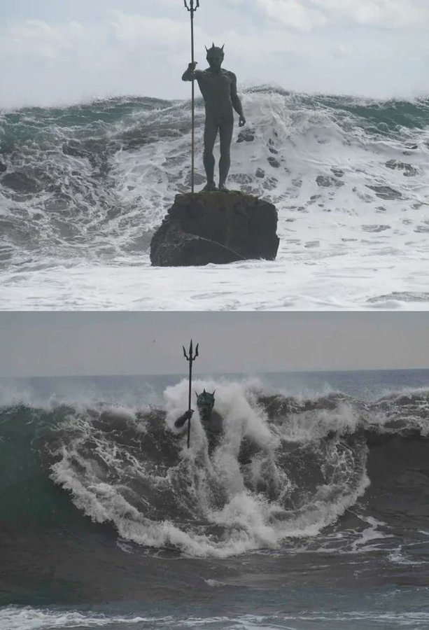 LonggAgo's tweet image. Statue of Neptune rising from the sea at Melenara Beach in Spain
