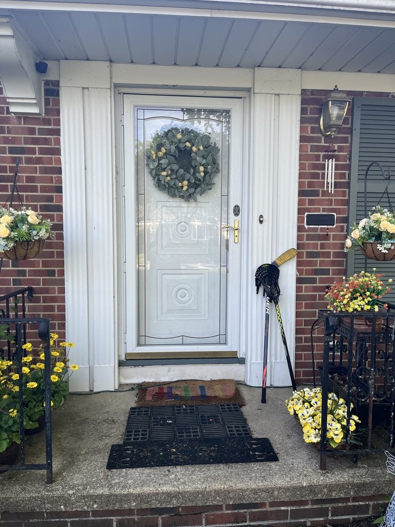 BaySchoolsOH's tweet photo. Some of our amazing community members are doing a #SticksOutForDylan theme, putting lacrosse (and even hockey sticks and soccer balls) out on their front porches. #12 #6 https://t.co/PAKLkzrCxQ