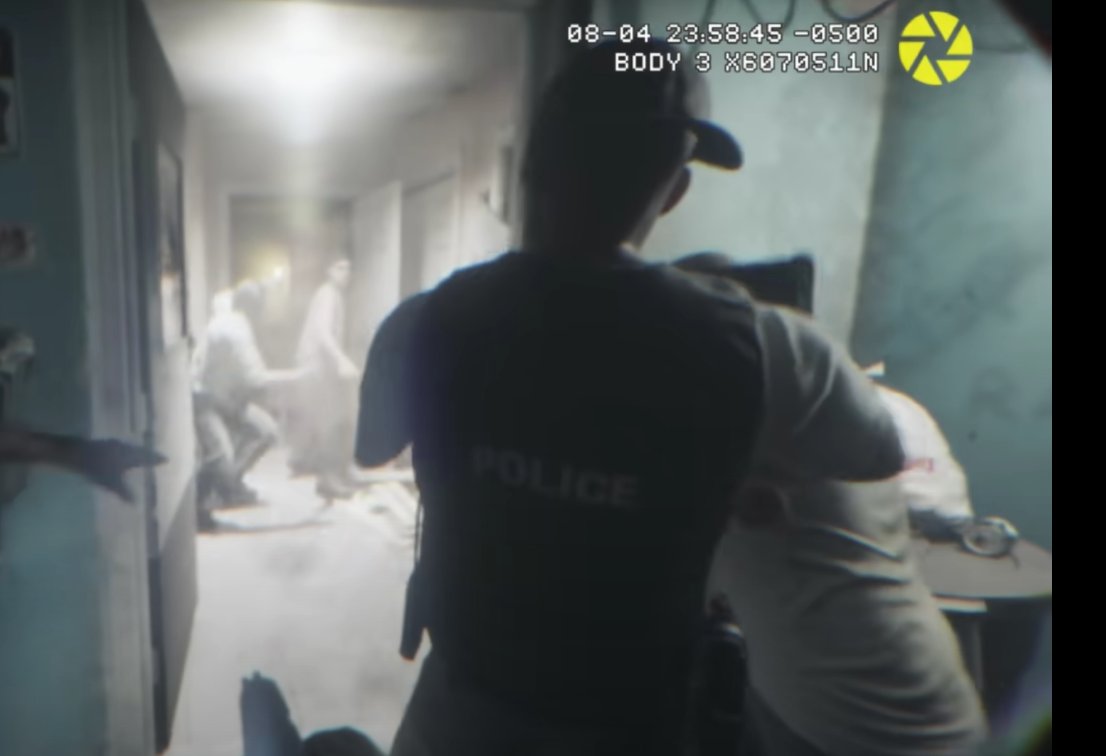 4. A Cena do Colete à Prova de Balas