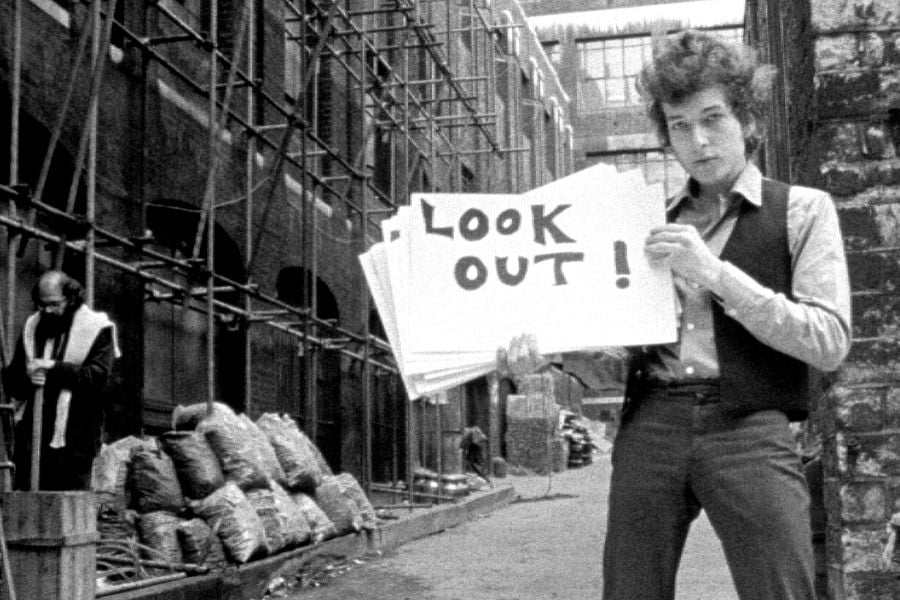 60 years ago today, Bob Dylan filmed the promo clip for “Subterranean Homesick Blues” outside London’s Savoy Hotel. Cue cards, Ginsberg in the background, and rock’s first great music video—Dylan changed how we watched music before MTV even existed.