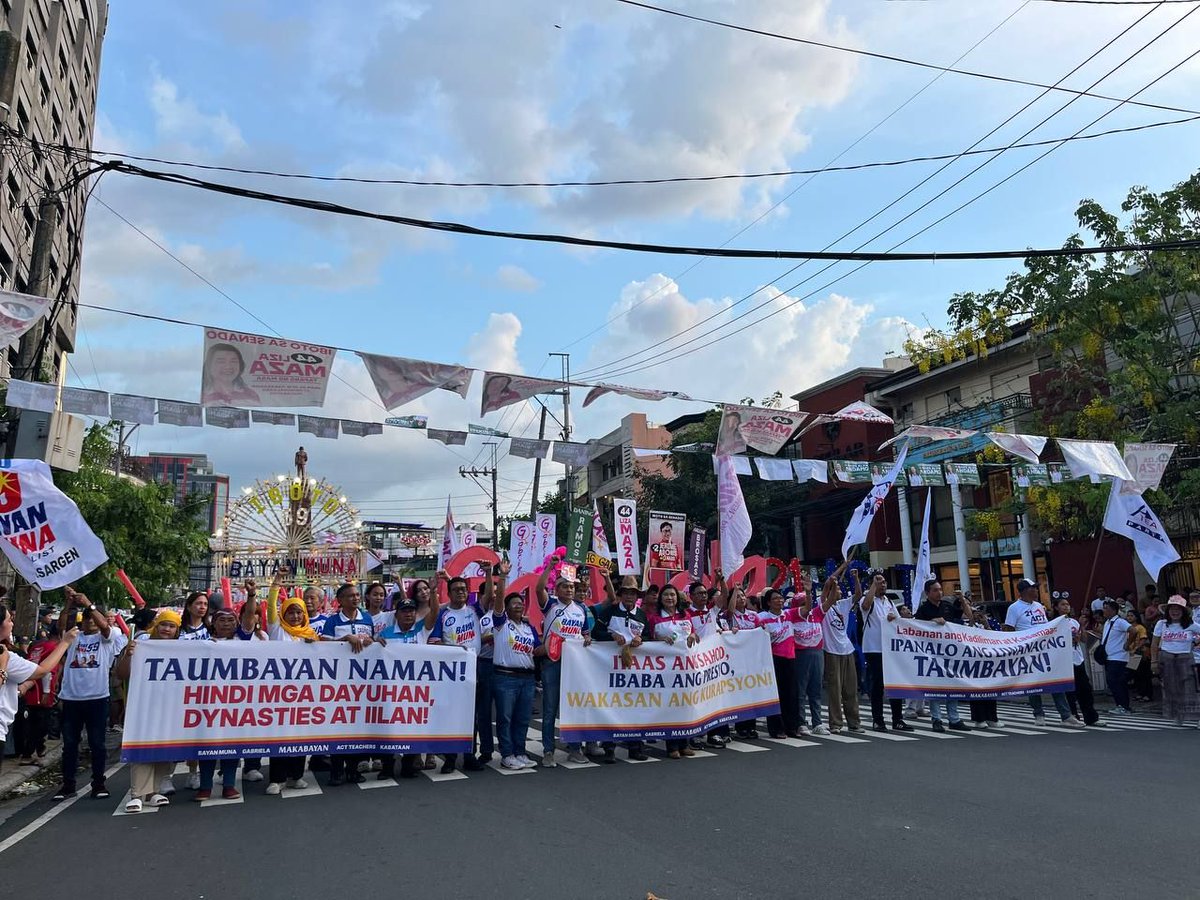 Makabayan’s senatorial bets and party-list groups, along with their supporters, march in Quezon City for their miting de avance on Friday, May 9. #PHVote | via Iya Gozum/Rappler