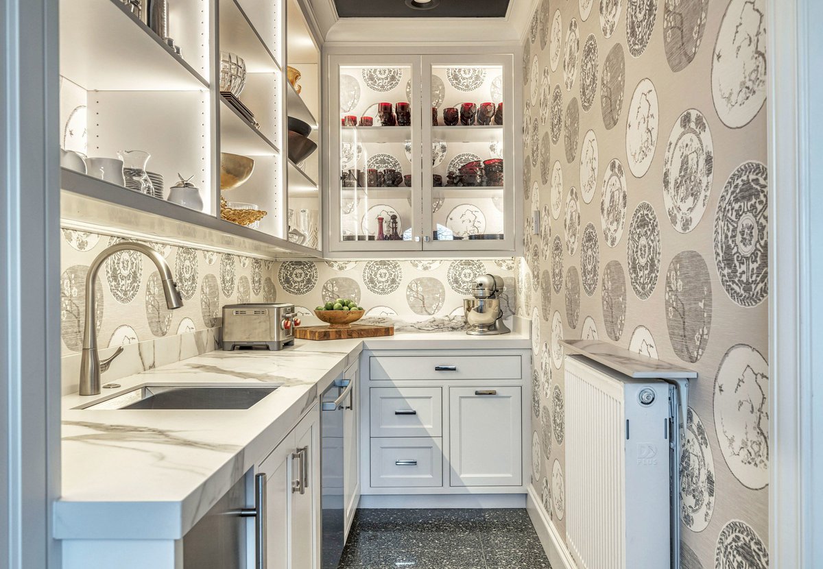 This beautiful butler’s pantry by Cedar Rapids-based Wiles Design Group blends storage, structure, and style.

Bright, organized, and wrapped in beautiful wallpaper—it proves practical spaces can still pack a design punch.

bit.ly/3Nu8pK7