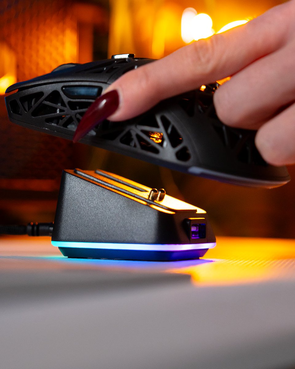 Docking sequence successful. 🚀 Slide your LIV (Plus) Wireless onto the dock to start charging wirelessly. The magnetic pins guide the mouse into the sweet spot and keep it secure, while the sticky rubber base keeps it from moving around your desk. 💪
