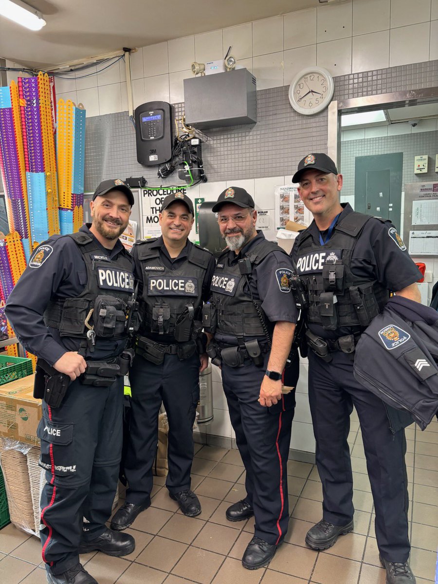 Members of the Financial Crimes Unit and Cyber Crimes Unit join forces to serve the public on McHappy Day in London. 😊🍔🍟