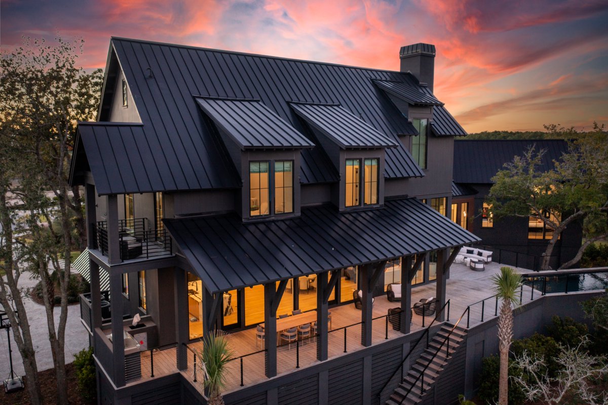 📸 Sleek, bold, and built to last — this stunning home features a high-performance metal roofing system from Carlisle that delivers both durability and architectural impact. 🏡✨ Whether viewed from the front or back, the clean lines and rich finish elevate the entire design.