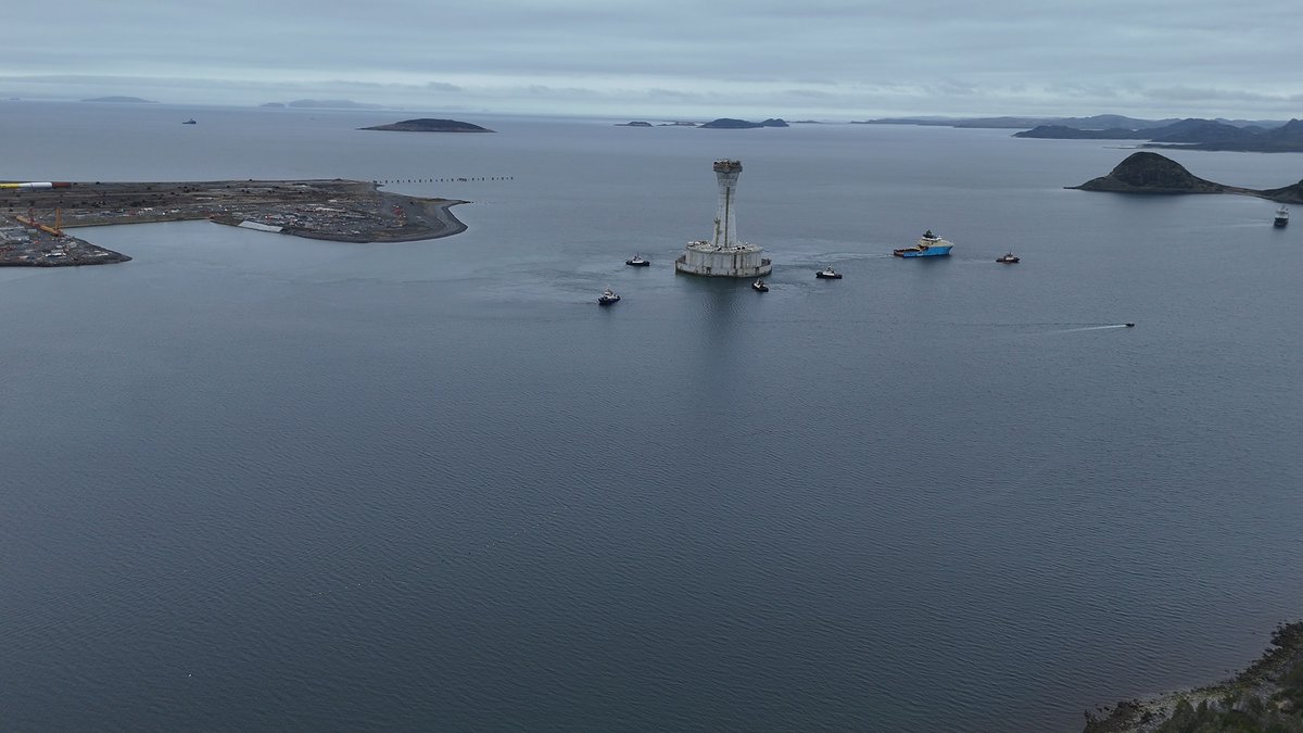 portofargentia's tweet photo. Cenovus West White Rose CGS now departed the Argentia Graving Dock and entering the deep water (18m cd) tow channel out to Placentia Bay. The Port thanks Cenovus for helping place Argentia on the world stage as a host to such world class projects. Thank you! https://t.co/QkFEyfBIeo