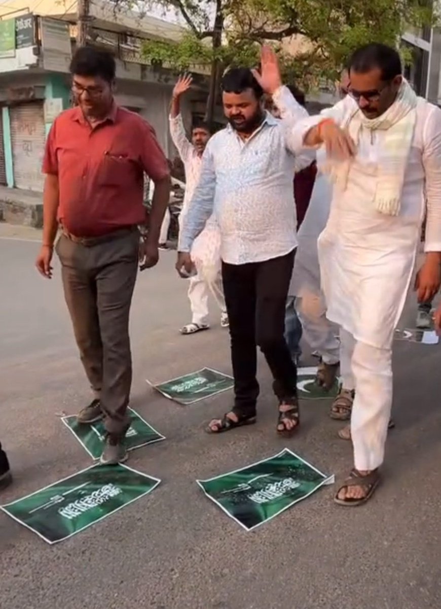 This is the same flag which is spreaded on road, and they walking on that and disrespecting.

Same flag Indian hang with Indian flag on the arrival time of Prince Salman.