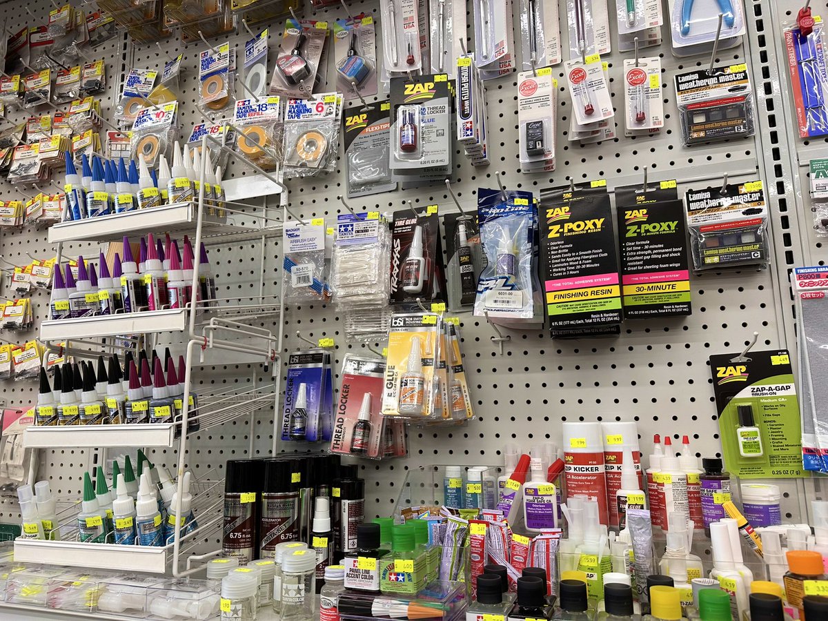 All the plastic model glue, tools, tape, and weathering supplies you could ever need. 
Right here at Raleigh Hobby!
