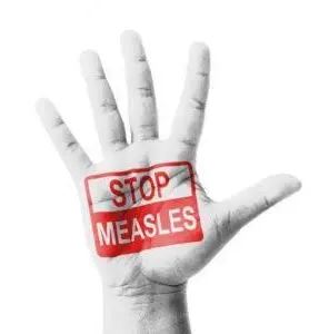 Measles: forgetting history and being doomed to repeat it?

Measles is a highly contagious, whole-body viral infection.
Before immunization (1970s) it killed at least 2.6 million/yr, and left many kids with lifelong disabilities (deafness, developmental delay)