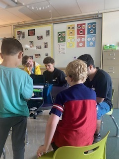 Affton Day of Service Bonus Post - Some of AHS' Advanced Marketing students played games designed by Mesnier students.