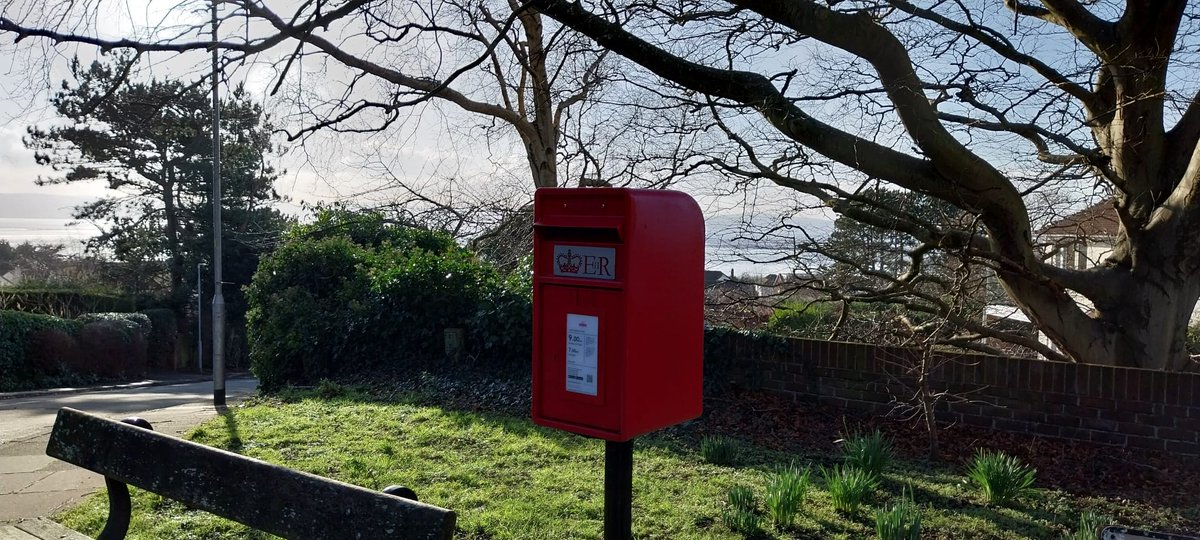 A gloriously sunny #postboxsaturday coming to you from West Kirby, Wirral.  Peer between the branches and you'll see the beautiful Dee estuary and the hills of north Wales beyond