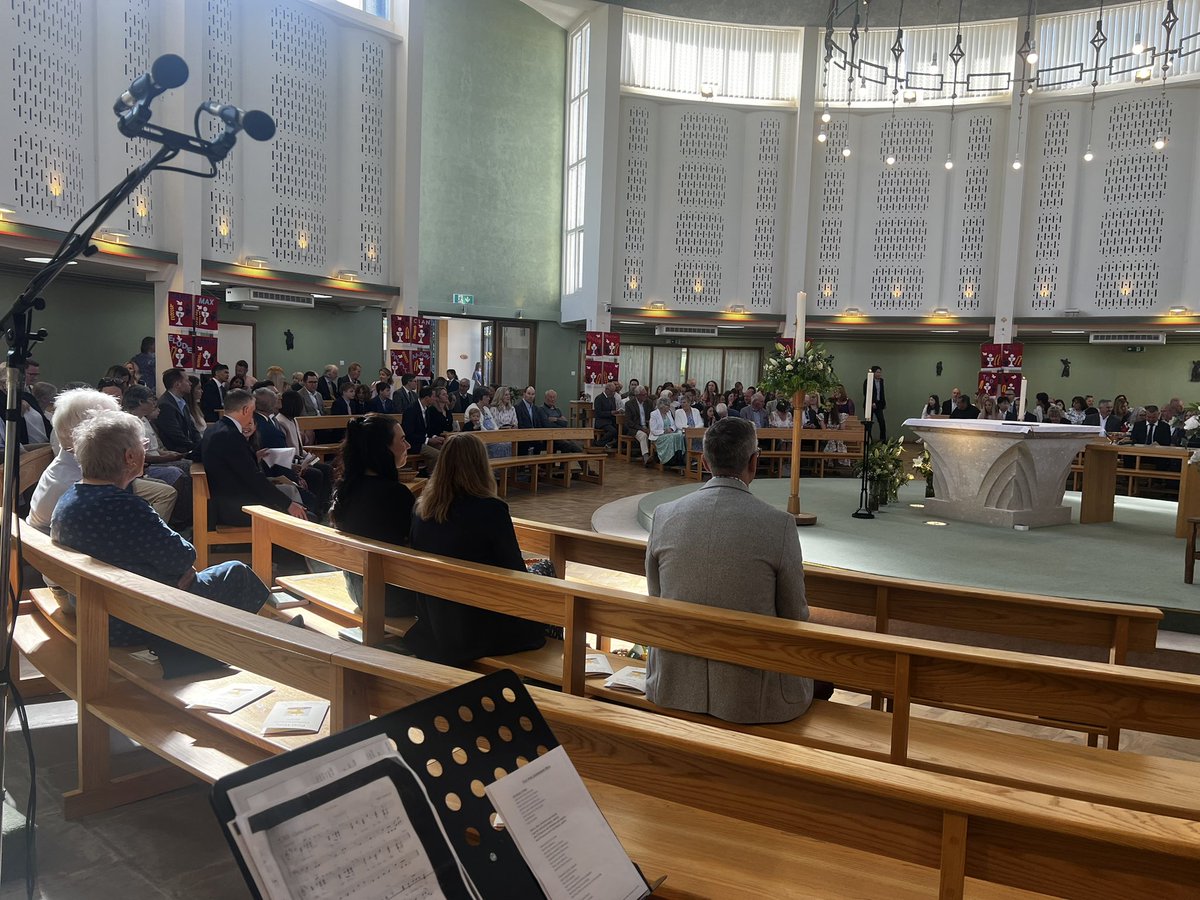 Lovely day, packed church for kid’s 1st holy communion: musicians servers and clergy nearly ready ❤️