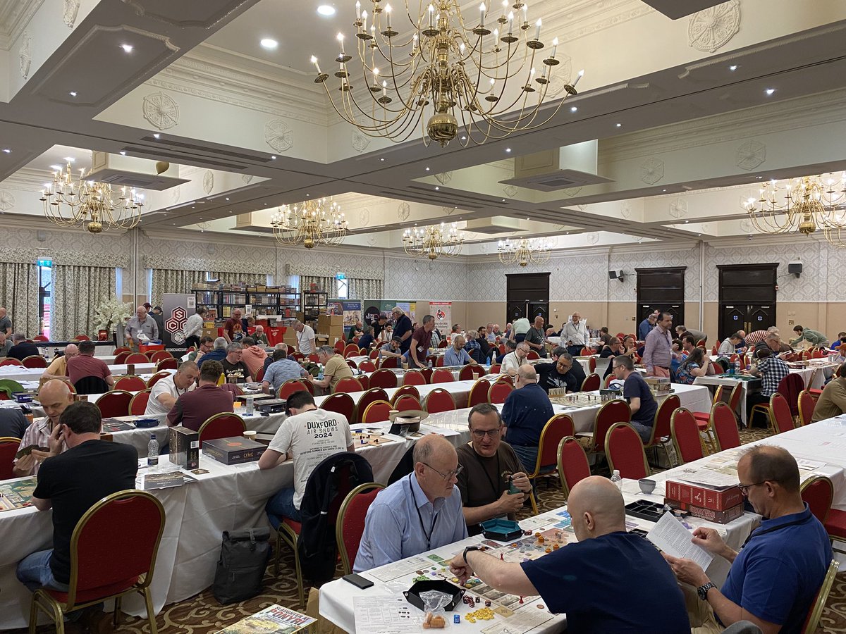 Enjoying Punchedcon in UK with my designer friend Wolfgang (ASSAULT series). Many SoD games are being played. It’s great to meet many gamers from UK in person.
The “Windsor Suite” offers tables for monster games. 
Well done Rich &amp; Phil. Superbe event!