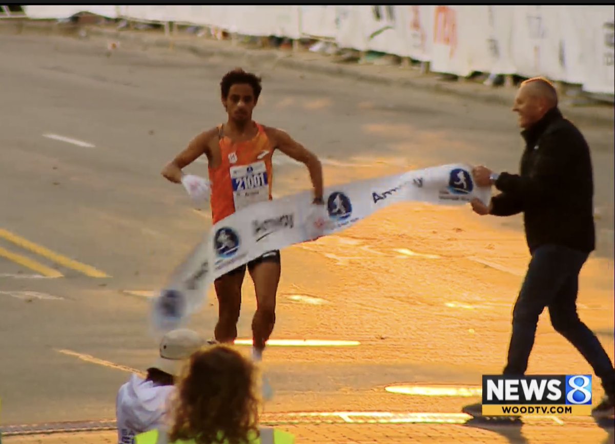 Shuaib Aljabaly with the victory in the 5K at the Amway River Bank Run!