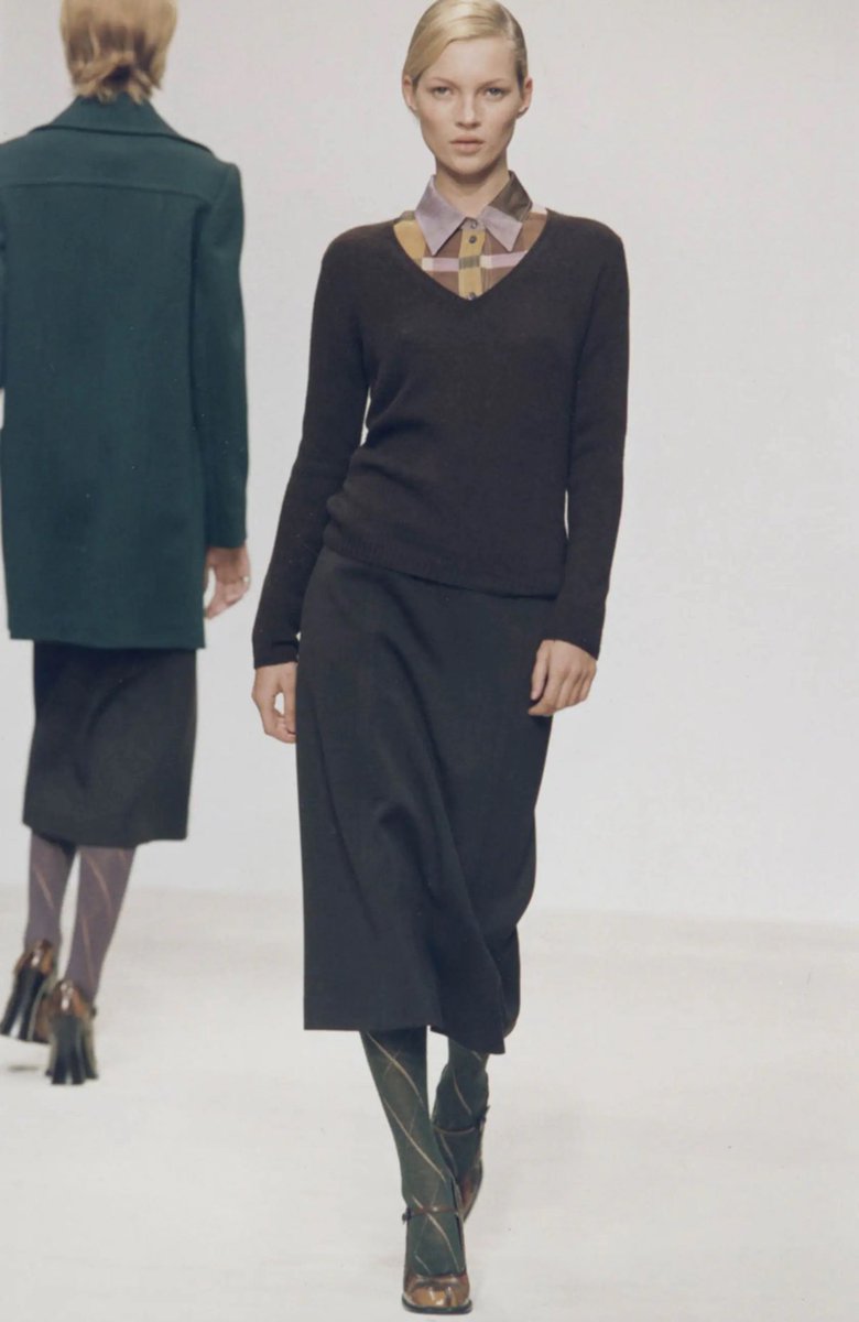 blondiejpg's tweet photo. Happy birthday to the queen herself, Miuccia Prada. Wearing obviously a Prada f/w 1996 sweater paired with a skirt and heels from the Prada s/s 1996 collection backstage at a Miu Miu show https://t.co/73e6vgrUnF