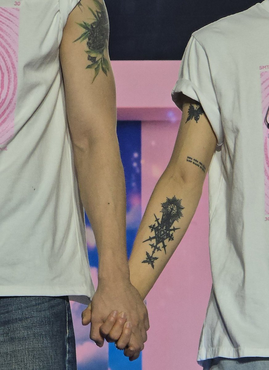 their tattoos complement each other, this shot is so lovely.