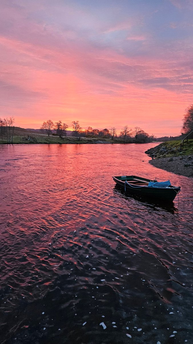A fisherman's boat at sunrise.