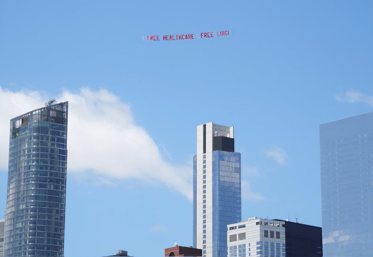 NOW: Plane flyover banner spotted across NYC that read "Free Healthcare Free Luigi" referring to Luigi Mangione.

Photo given by Michelle Lee