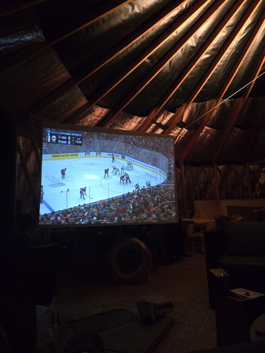 tynan's tweet image. Watching the @GoldenKnights playoff game on our remote island in Canada. Wild to beam Internet from the mainland and stream to a projector.