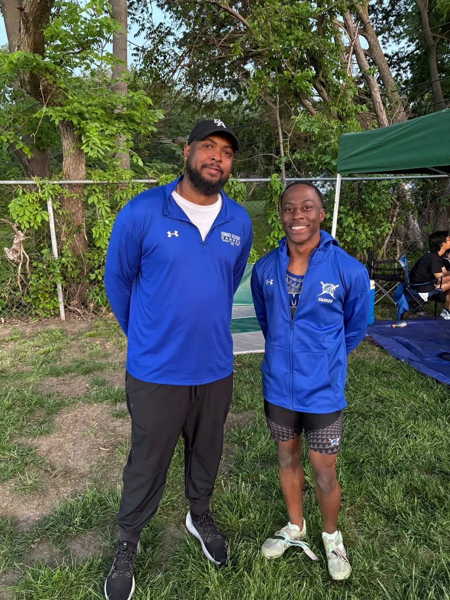 20 Years Later: Senior Sommyr Moore (right) took second in the long jump at the prestigious SM North Relays on Friday and broke the Sumner Academy triple jump record with a jump of 46’3” (#4 KS, #2 5A). The record was held by assistant coach and Sumner 2005 grad Milton Henry Jr
