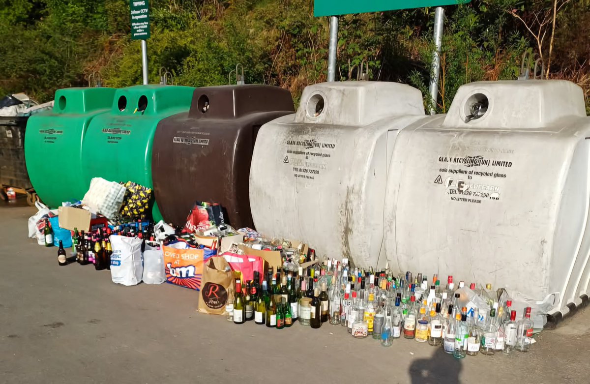 Our town's bottle bank this weekend. Great British example of drinking/ recycling/ stacking it very neatly.