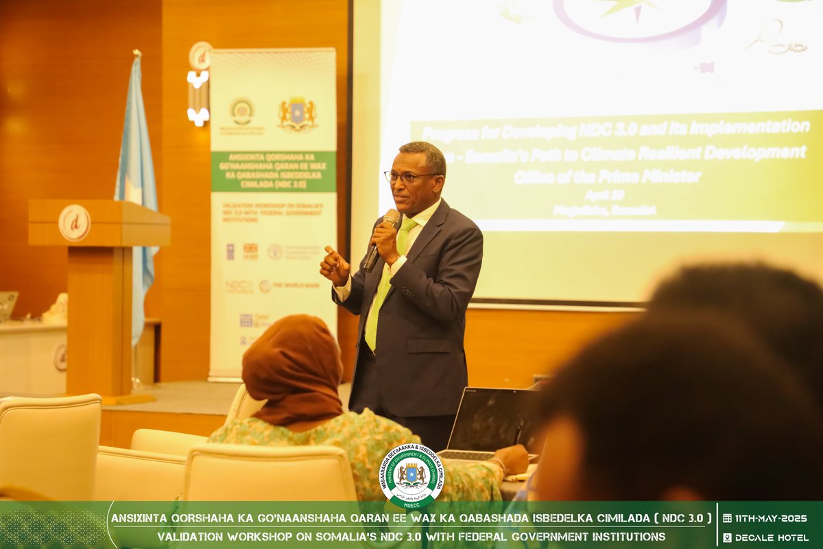 MoECC_Somalia's tweet photo. Happening now at the NDC 3.0 Validation Workshop: Lively engagement as groups interact with Dr. Abdullahi Khalif, National NDC Country Facilitator! Participants are posing sharp questions and offering valuable feedback on the presentations and key documents.

Dr. Khalif is responding, facilitating a crucial dialogue for validating Somalia's climate action plan in real time.