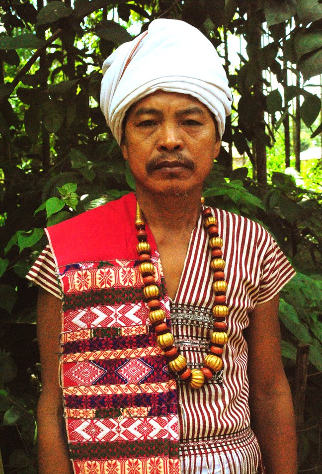 Doesn't he (monochrome image) look like an Indian man from some north-eastern tribe? He's actually a Taiwanese man from one of the 16 indigenous tribes of the island. 

Clicked it at the Shung Ye Museum of Formosan Aborigines, Taipei. 

To illustrate what I'm talking, I'm putting