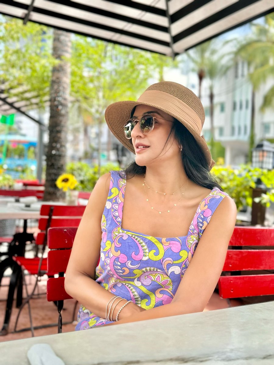 Just out here matching the vibe, the dress, and the mood!” 💚💜🍭🍬