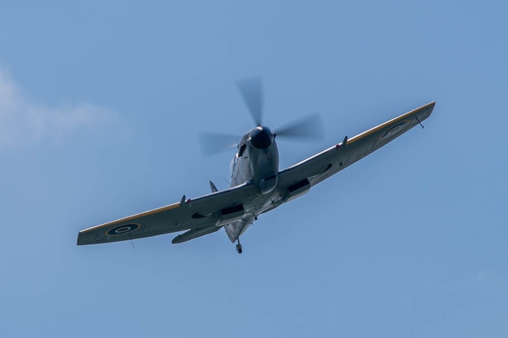 Photo_Rutland's tweet image. Spitfire TE311 of the @RAFBBMF over #Stamford this afternoon and looking lovely in the sunshine. The word "LONG" on the side is in tribute to Squadron Leader Mark Long, who tragically lost his life in a crash last year. #Spitfire #bbmf