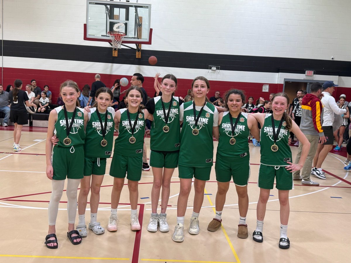 Coach Boos and the girls bringing home the hardware from the 216!