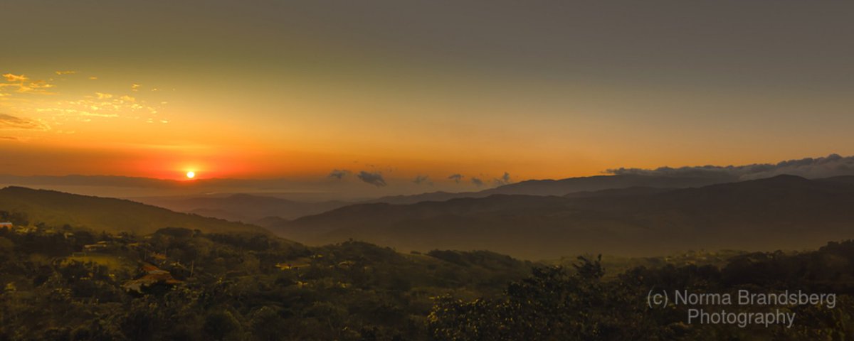 What sunsets and sunrises we saw a number of years ago in Costa Rica. In January burning of the sugar cane fields occurs in preparation  for growing in the new year putting nutrients back into the earth. The resulting air is filled with micro particles that reflect the sun as it