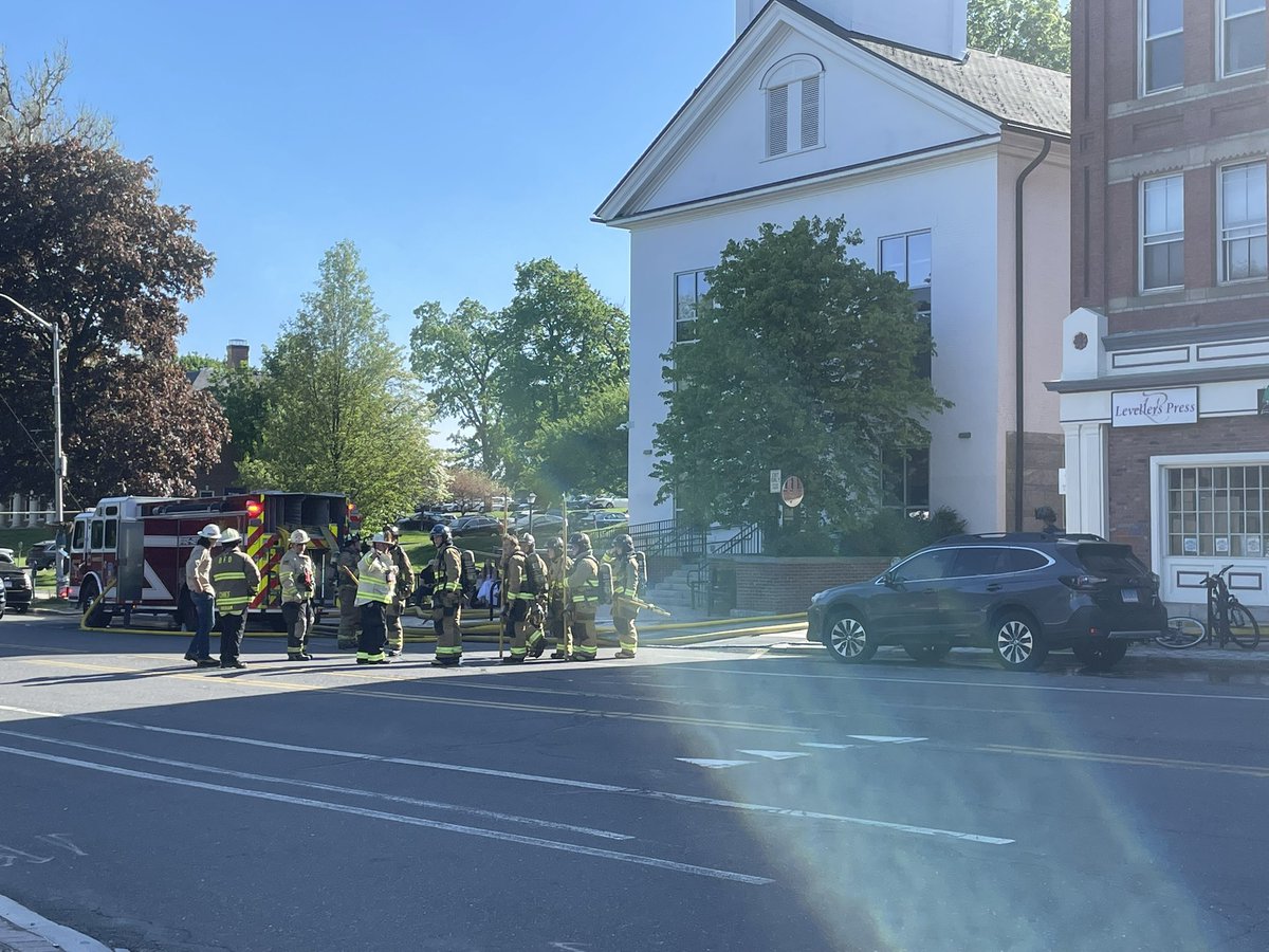 A structure fire in the La Veracruzana building in downtown Amherst. Smoke coming out of top few floors and a big fire department presence on scene including crews from Amherst, Belchertown, Hadley so far. Prays it’s contained quickly.