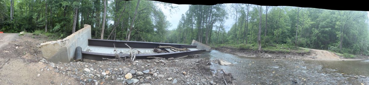 brandoncfoster's tweet photo. Panorama of the Old Fort Gateway Trailhead – 5.11.25

The sheer force of Hurricane Helene.

This isn’t just a bridge pushed downstream—it’s been flipped entirely. Nature’s power is humbling, and devastating. 

#OldFortNC #HurricaneHelene ⁦@CampGrier⁩ https://t.co/Jcno4Cpneb