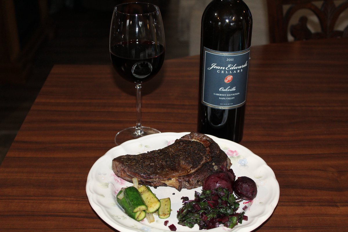 Dinner was ribeye steaks cooked w/the sous vide 3 hrs@130 degrees &amp; finished w/my torch. Sides were roasted beets and sautéed baby zucchini fresh from our garden. We also sautéed the tops to try them out. A 2011 <a href="/JeanEdwardsWine/">Jean Edwards Cellars</a> Cabernet Sauvignon Oakville paired perfectly #WINE