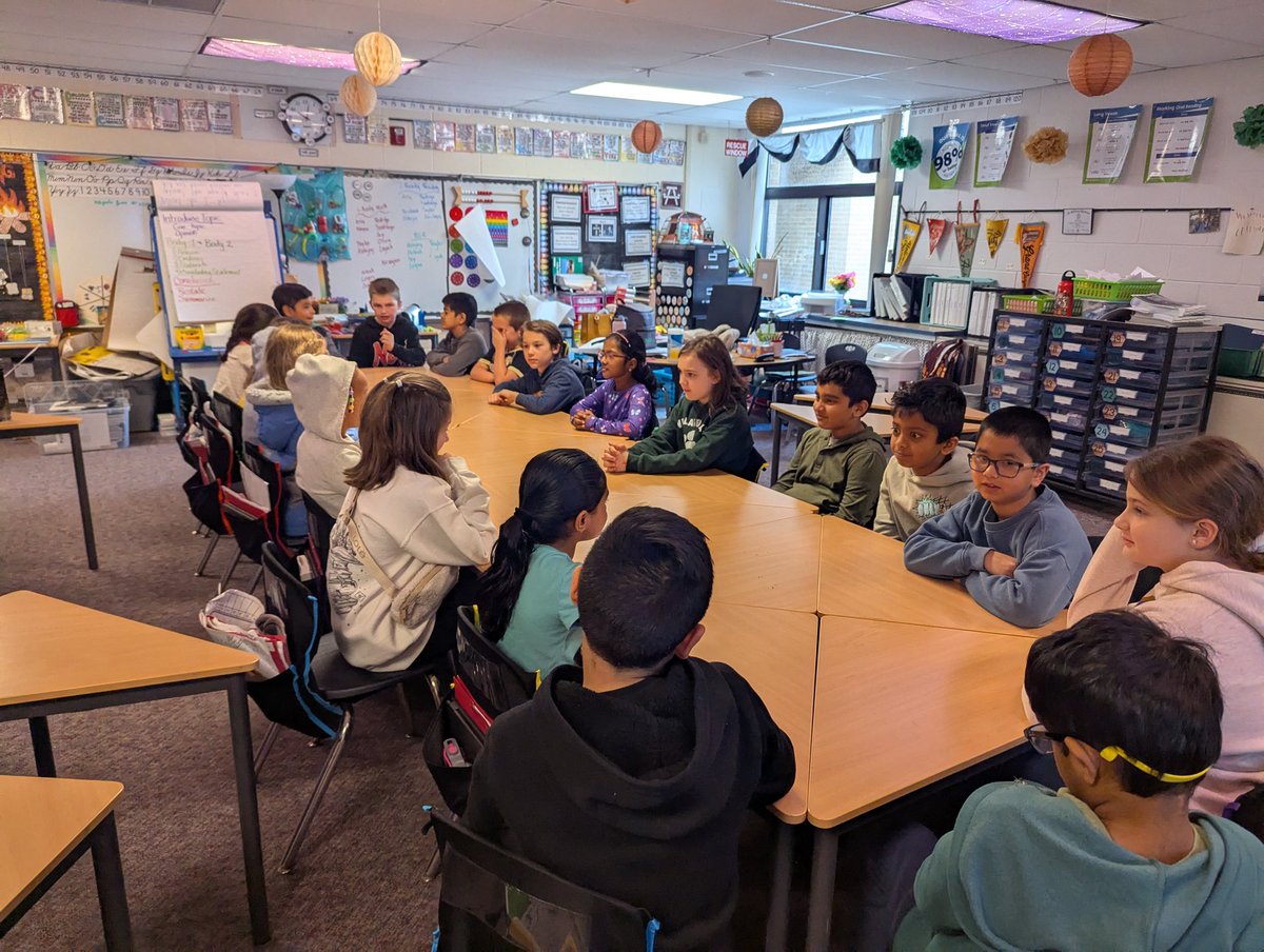 Preparing for our Socratic seminar and having a discussion about space. <a href="/NoviVillageOaks/">Village Oaks Elem.</a>