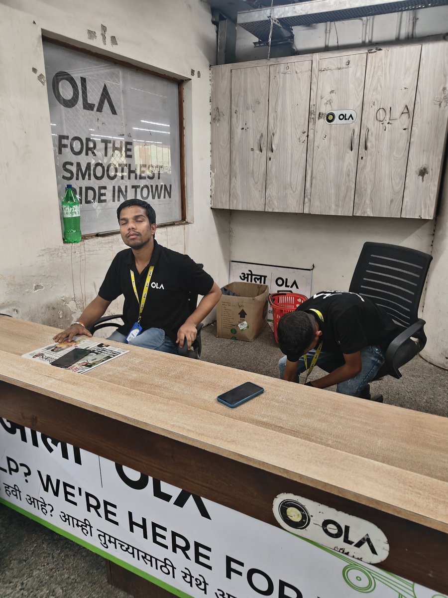 fcb_akashgr's tweet photo. There is an @ola_supports counter where 2 guys are sitting and on approaching, the response is just book Uber. Dude wtf? Not sure who is paying them to sit there and solve customer issues. https://t.co/Xo7vBhYP5v