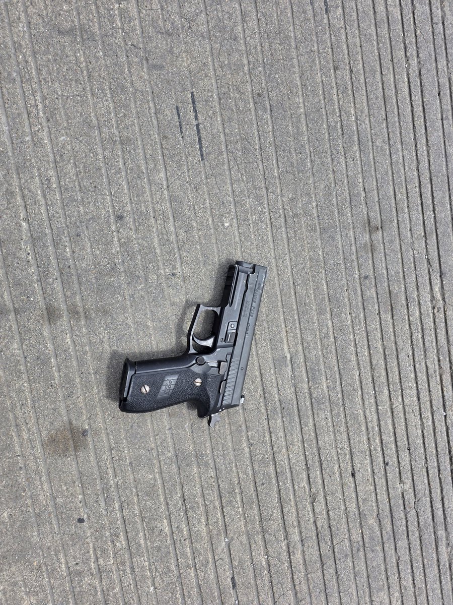 BREAKING: A man wanted for attempted murder has been shot during an exchange of gunfire with MNPD officers on the Division Street Bridge. One officer was grazed on the leg. The suspect has been transported with critical injuries. He had the pictured semi-auto pistol.