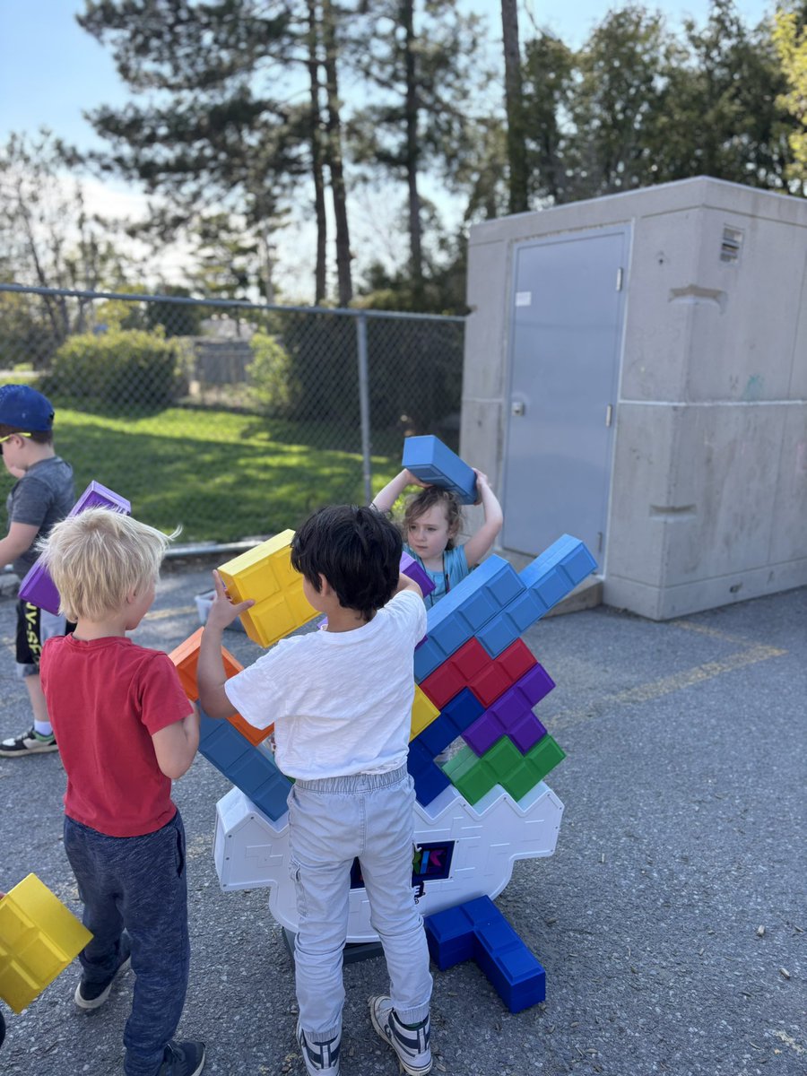 MissWilson019's tweet photo. The Kinders are LOVING our new outdoor Tetris! 

Teamwork, creativity, and a whole lot of color! These little builders took on a giant Tetris challenge and absolutely loved it! https://t.co/GK0chrbMHP