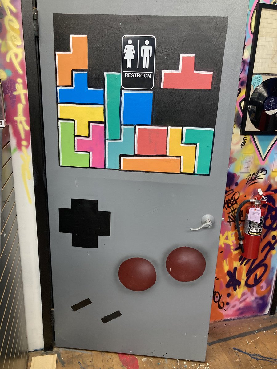 The local retro collectibles store bathroom door is fantastic.