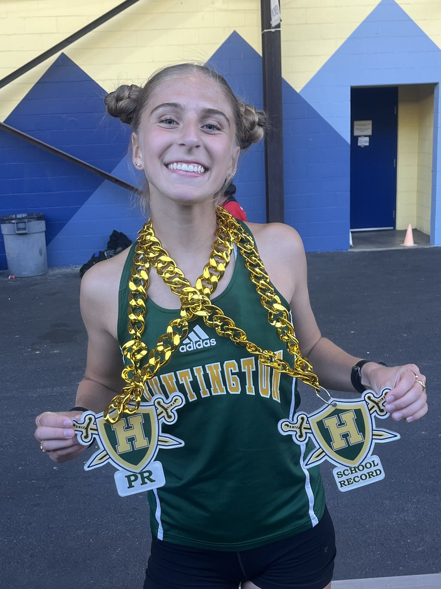 Laurel Johnson with the PR and lowering her school record in the 1600m run (5:21.49)