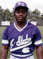 Dave Baker grew up in Manhattan and became K-State’s coach in 1977.  He was the first African American head coach in the Big 8.  As a player, Baker played for the 1965 NBC champion Rapid Transit Dreamliners and once caught Satchel Paige in an exhibition. ksbaseballhof.com.