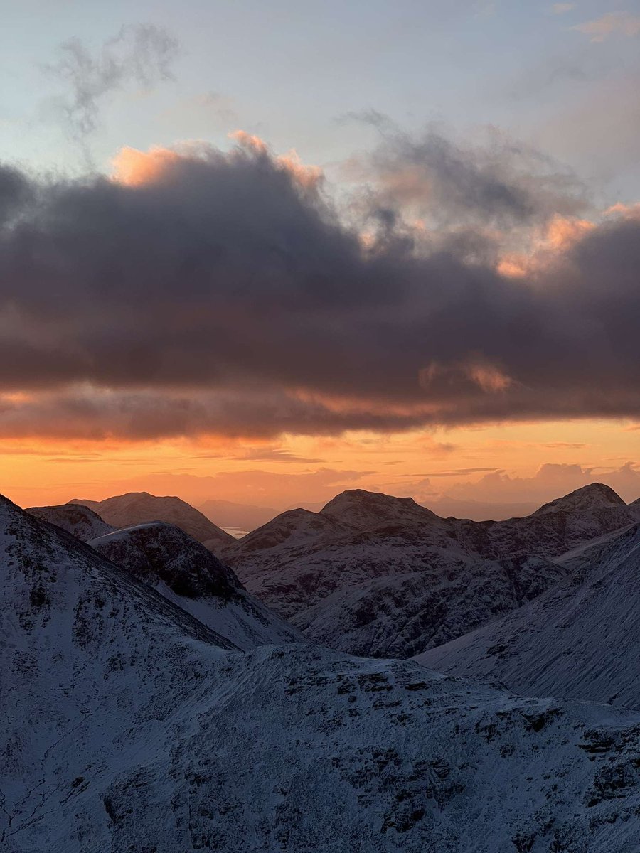This is your sign to go watch a sunset from the top of a mountain