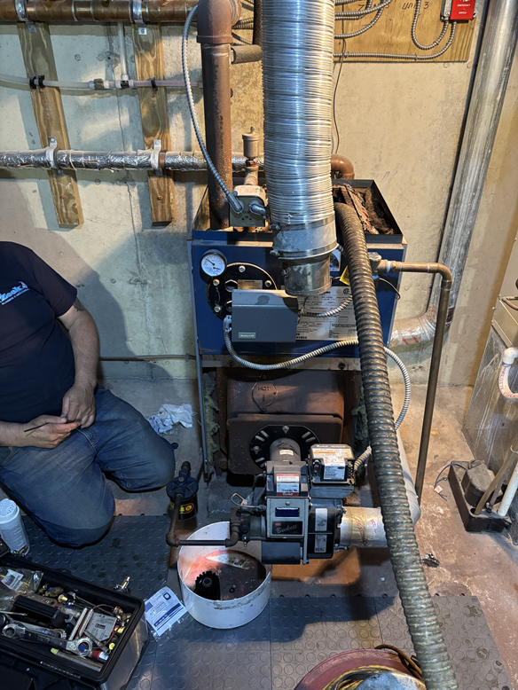 ZeekPlumbing's tweet photo. Here are some pictures of an oil boiler service we completed last week by our technician Rich!
He is holding two cad cells, one of which was replaced. The old one is on the right and the new is on the left. They also vacuumed and cleaned soot and debris from the boiler. #plumbing https://t.co/zBgyUIp5ph