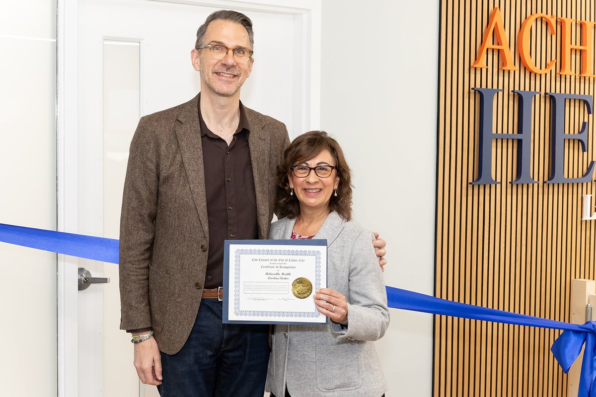 Earlier this month, Freddy Puza, Vice Mayor of Culver City presents Carmen Ibbara, CEO of Achievable Health, an official welcome certificate from the City of Culver City. This took place at the ribbon-cutting ceremony to open the new Achievable Health Lovelace Center.