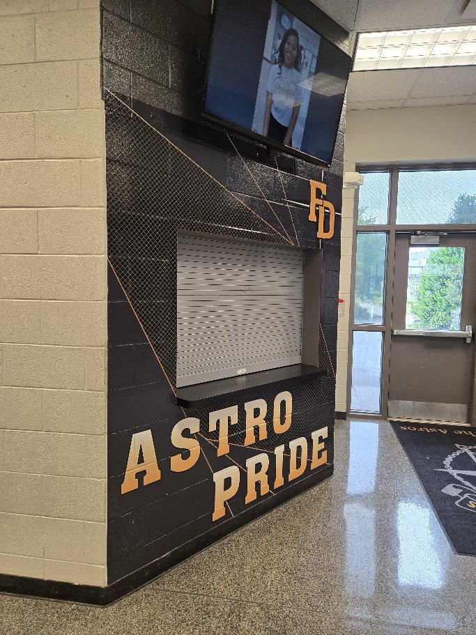 Custom adhesive vinyl featuring the school logo, name, and sports team enhance the school's identity with vibrant, unified branding. To inject a bold sense of school pride and team spirit into your school call, The Windscreen Factory at 888-619-2228 today.  #adhesivevinyl