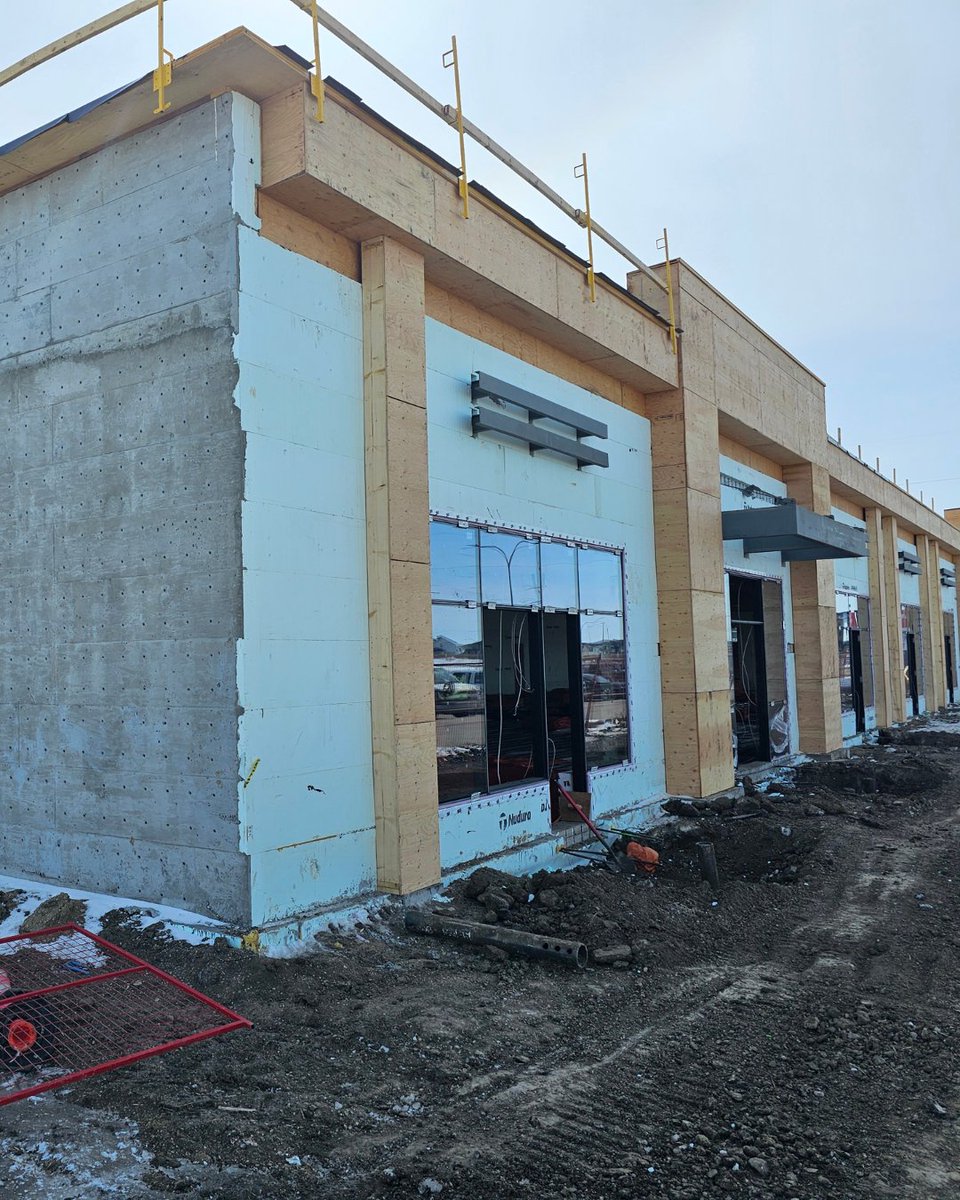 Details from this Saskatoon commercial build!

➡️ Exposed concrete wall where non-combustible construction was needed.
➡️ Wood build outs for curb appeal.
➡️ Steel accents/signage secured to ICF.
➡️ Ledges added for structural connections.

Versatility in action with <a href="/NUDURAICF/">NUDURA Insulated Concrete Forms</a>!