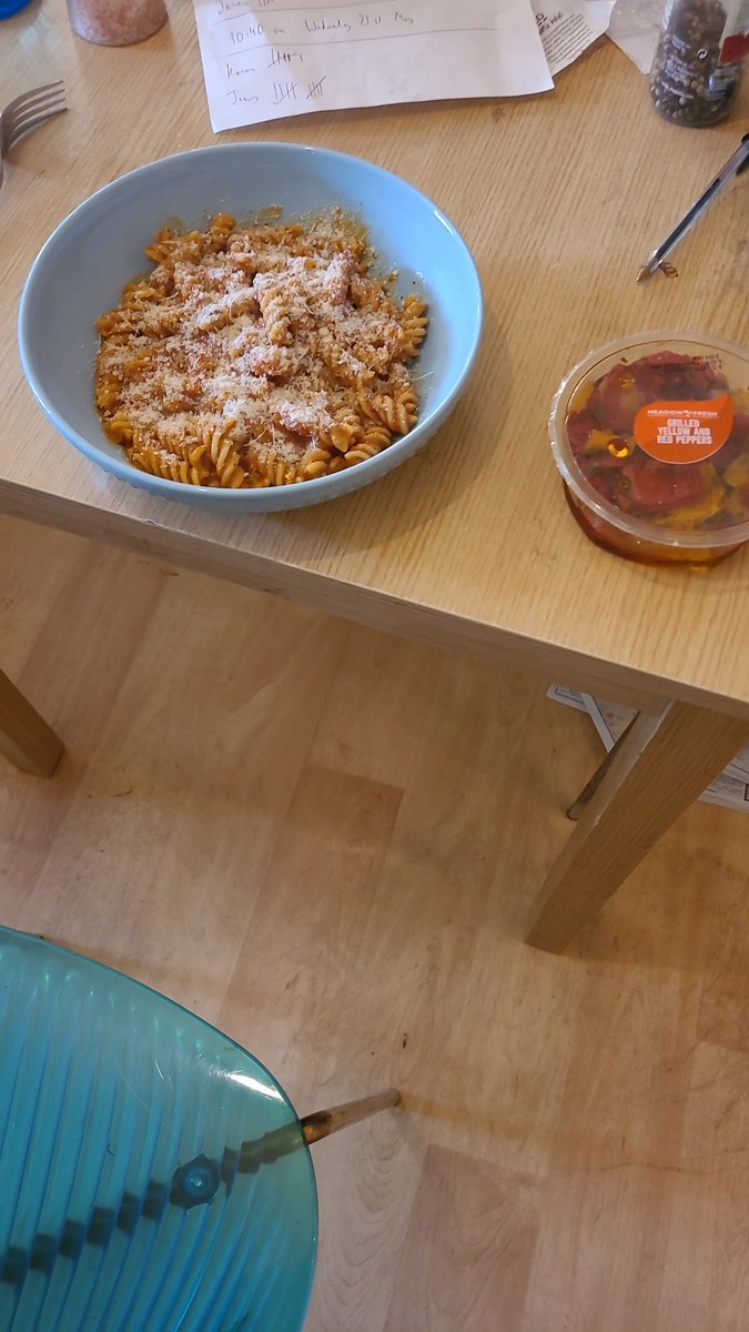 Pasta with budget pasta sauce, turmeric, herbes de Provence, salt, pepper and Parmesan, with side of grilled peppers.