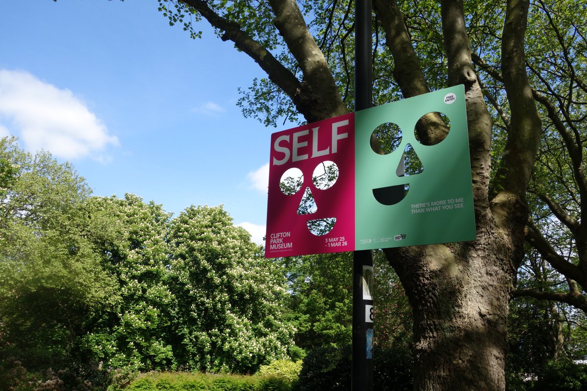 CLIFTON PARK MUSEUM. Nice to see our posters so perky. When I walk through the park, which is often, I keep seeing flashes of pink through the trees. Sometimes it's blossom, sometimes it's us.